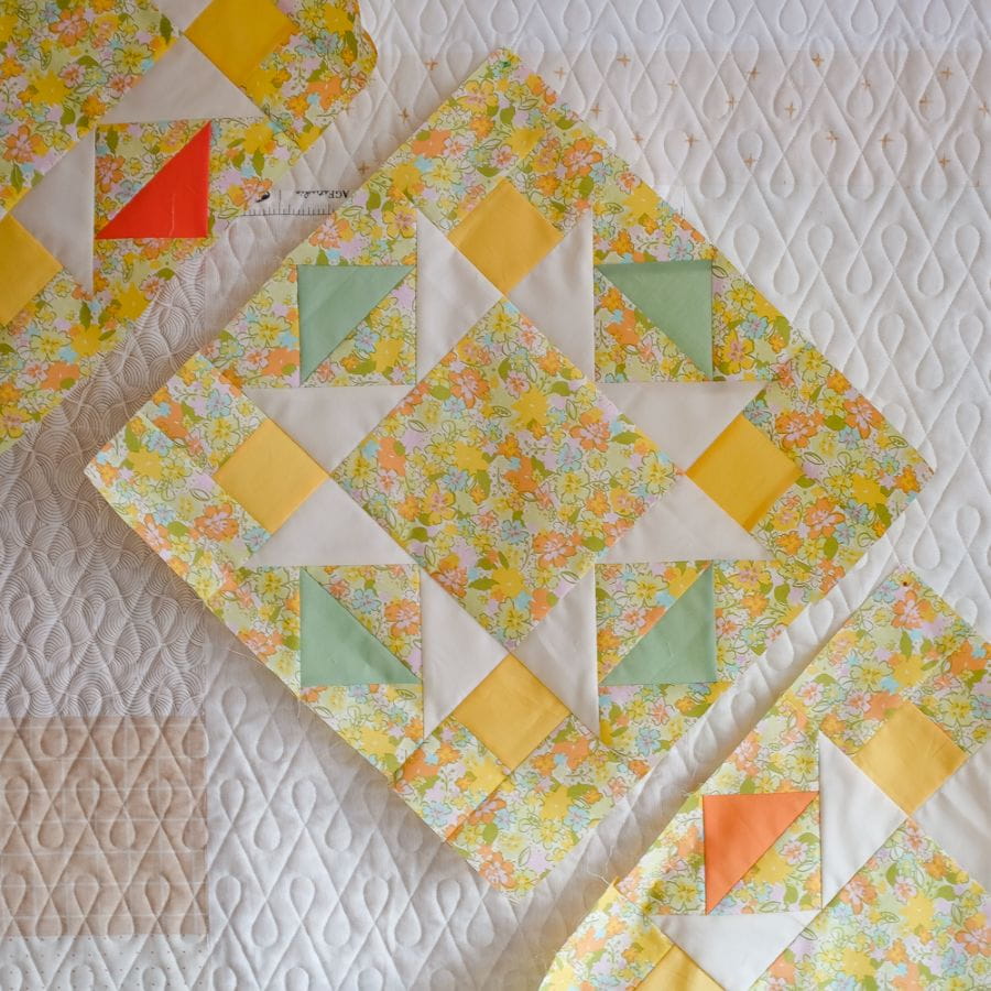 3 colorful quilted blocks of fabric